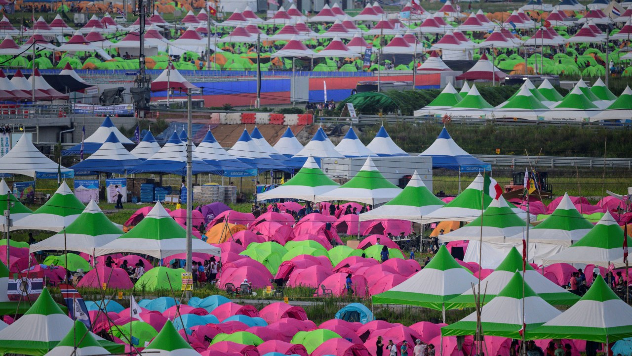 A general view shows the campsite of the World Scout Jamboree in Buan, North Jeolla province on August 5, 2023. American and British scouts pulled out of the World Scout Jamboree in South Korea, citing scorching temperatures, as organisers weighed whether to cut short an event also reportedly plagued by dire campsite conditions. (Photo by ANTHONY WALLACE / AFP)