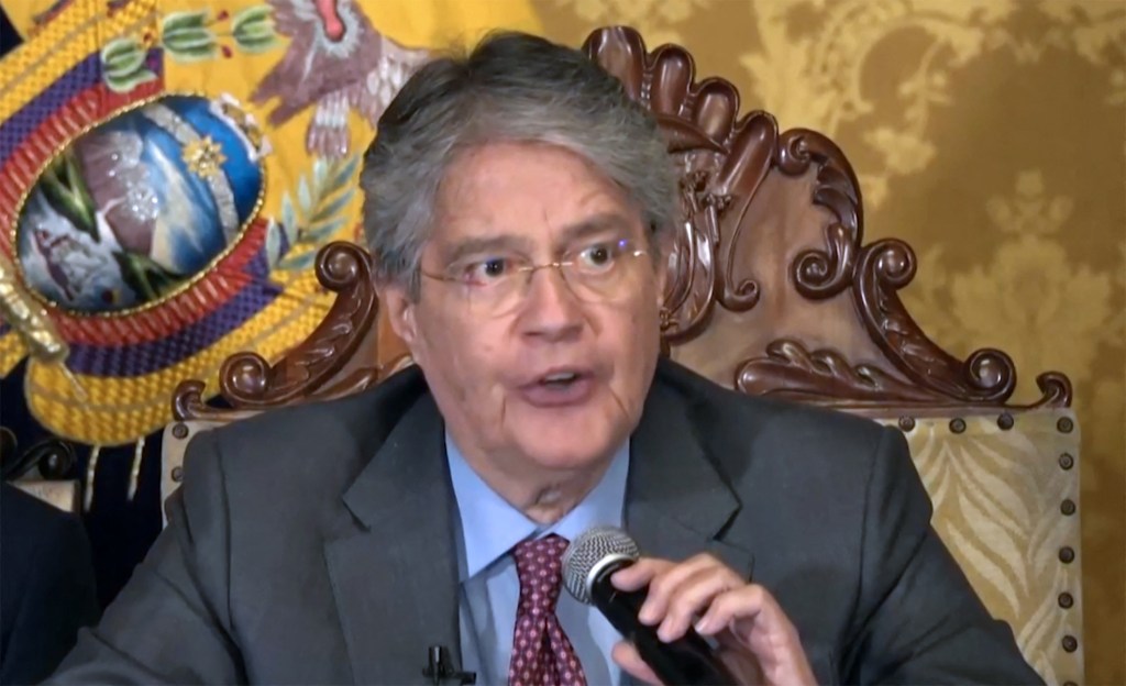 Grab taken from a handout video released by the Ecuadorean Presidency showing Ecuador's President Guillermo Lasso declaring a state of emergency after the assassination of presidential candidate Fernando Villavicencio, in Quito on August 10, 2023. Fernando Villavicencio, a 59-year-old anti-corruption crusader who had complained of receiving threats, was shot dead on August 9 while leaving a rally in the nation's capital, prompting Lasso to declare a state of emergency and blame the assassination on organized crime. (Photo by Ecuadorian Presidency / AFP) / RESTRICTED TO EDITORIAL USE - MANDATORY CREDIT "AFP PHOTO / ECUADOREAN PRESIDENCY" - NO MARKETING - NO ADVERTISING CAMPAIGNS - DISTRIBUTED AS A SERVICE TO CLIENTS