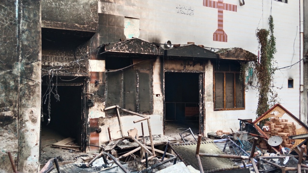 View of a burnt church on the outskirts of Faisalabad on August 16, 2023, following an attack by Muslim men after a Christian family was accused of blasphemy Hundreds of Muslim men set fire to four churches and vandalised a cemetery during a rampage in eastern Pakistan on August 16, officials said, after a Christian family was accused of blasphemy.
