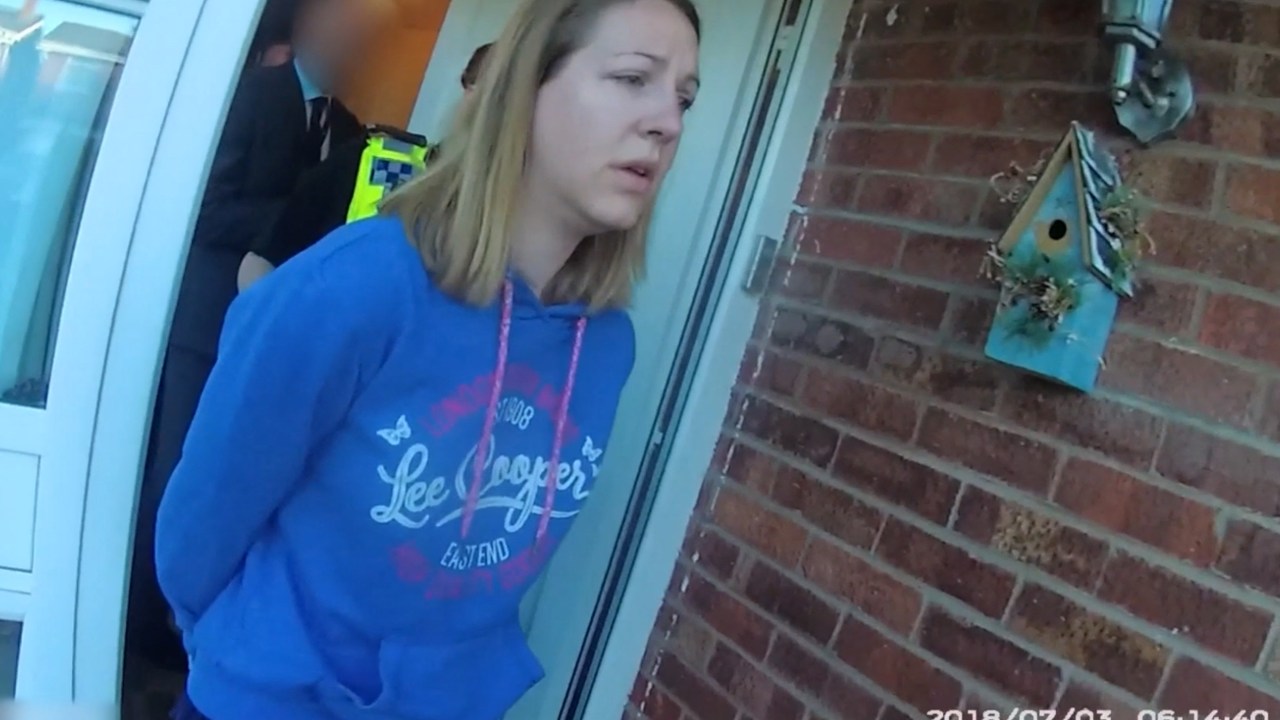 A handout image taken from police bodycam footage released by Cheshire Constabulary police force in Manchester on August 17, 2023, shows the nurse Lucy Letby being arrested at home in Chester on July 3, 2018. Lucy Letby was on August 18, 2023, found guilty of murdering seven newborn babies and trying to murder six others at the hospital neonatal unit where she worked, becoming the UK's most prolific killer of children. Letby, 33 -- on trial since October 2022 -- was accused of injecting her young victims, who were either sick or born prematurely, with air, overfeeding them milk and poisoning them with insulin. (Photo by Cheshire Constabulary / AFP) / RESTRICTED TO EDITORIAL USE - MANDATORY CREDIT " AFP PHOTO / Cheshire Constabulary/ Handout " - NO MARKETING NO ADVERTISING CAMPAIGNS - DISTRIBUTED AS A SERVICE TO CLIENTS