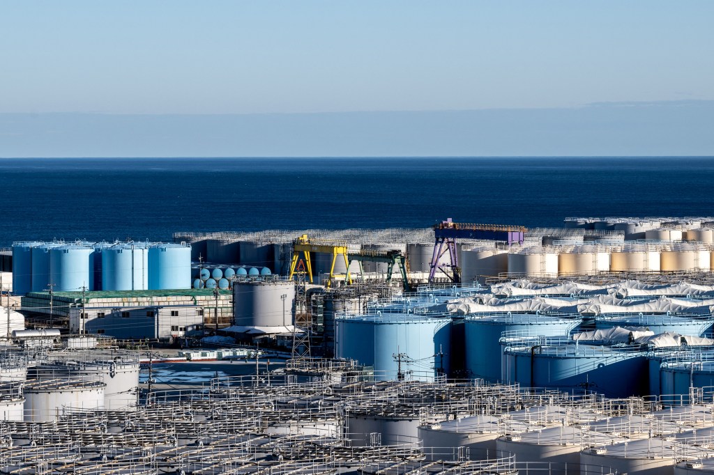 (FILES) This file picture taken on January 20, 2023 shows the storage tanks for contaminated water at the Tokyo Electric Power Company's (TEPCO) Fukushima Daiichi nuclear power plant in Okuma, Fukushima prefecture. Some 12 years after one of the world's worst nuclear disasters, Japan's premier said on August 22, 2023 the release of cooling water from the crippled Fukushima nuclear plant into the Pacific will begin on August 24, despite opposition from fishermen and protests by China. (Photo by Philip FONG / AFP)