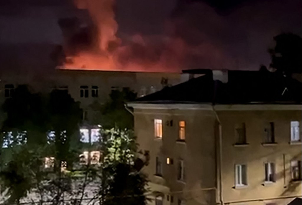 In this grab taken from a handout video posted on the Telegram account of Mikhail Vedernikov, the governor of Russia's Pskov region, on August 30, 2023, an explosion lights up the sky as the Russian military repell a drone attack on an airport in the northwestern city of Pskov. (Photo by Handout / TELEGRAM / @MV_007_PSKOV / AFP) / RESTRICTED TO EDITORIAL USE - MANDATORY CREDIT "AFP PHOTO / TELEGRAM / @MV_007_PSKOV" - NO MARKETING NO ADVERTISING CAMPAIGNS - DISTRIBUTED AS A SERVICE TO CLIENTS