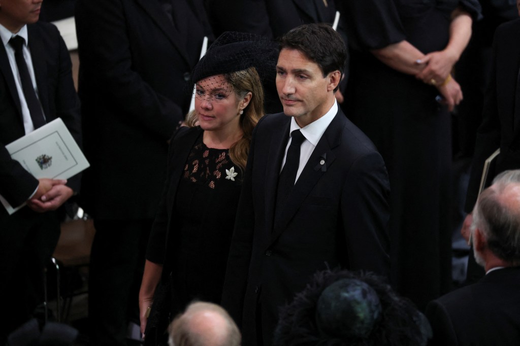 LONDON, ENGLAND - SEPTEMBER 19: Canada's Prime Minister Justin Trudeau and his wife Sophie Trudeau leave Westminster Abbey after the State Funeral of Queen Elizabeth II on September 19, 2022 in London, England. Elizabeth Alexandra Mary Windsor was born in Bruton Street, Mayfair, London on 21 April 1926. She married Prince Philip in 1947 and ascended the throne of the United Kingdom and Commonwealth on 6 February 1952 after the death of her Father, King George VI. Queen Elizabeth II died at Balmoral Castle in Scotland on September 8, 2022, and is succeeded by her eldest son, King Charles III. (Photo by Phil Noble - WPA Pool/Getty Images)
