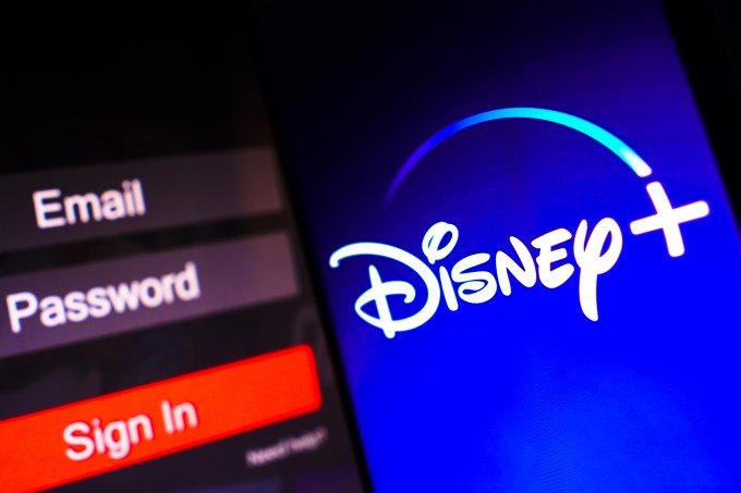 In this photo illustration, the Disney Plus logo is