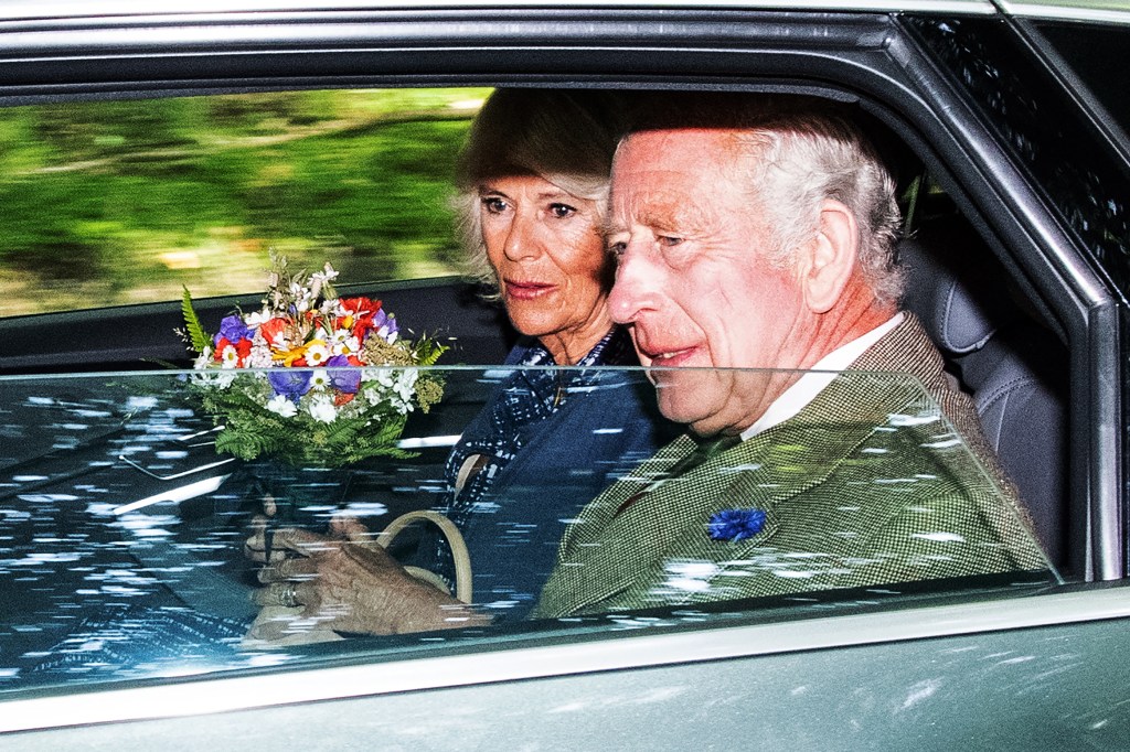 Britain's King Charles III (R) and Britain's Queen Camilla (L) leave after attending church in the village of Crathie, near Balmoral in central Scotland on September 8, 2023, on the first anniversary of the passing of the King's mother, Queen Elizabeth II. Britain on Friday, September 8, mark the first anniversary of Queen Elizabeth II's death but commemorations will be low-key with no official public events planned. (Photo by ANDY BUCHANAN / AFP)