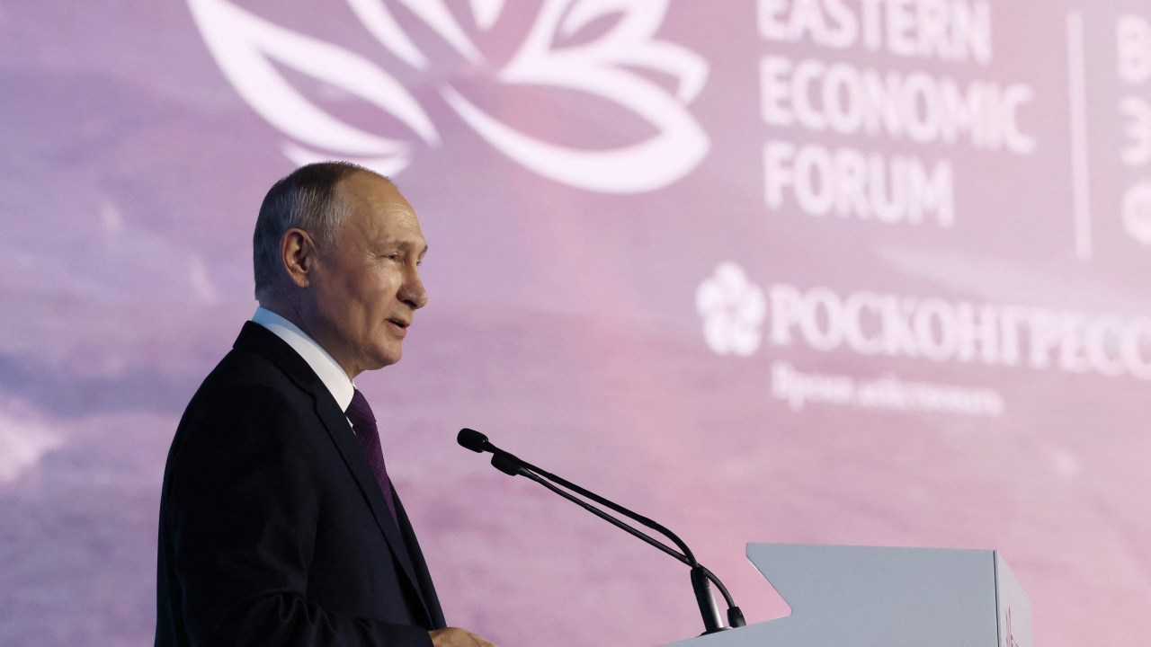 In this pool photograph distributed by Sputnik agency Russia's President Vladimir Putin addresses the audience during the Eastern Economic Forum in Vladivostok on September 12, 2023. (Photo by Mikhail METZEL / POOL / AFP)