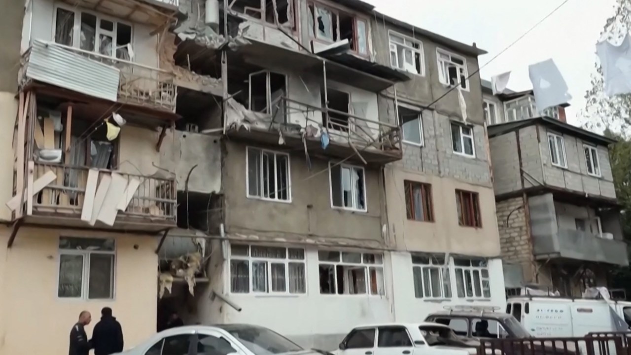 A video grab made on September 20, 2023 from footage released by the Nagorno-Karabakh Foreign Ministry shows damaged apartment buildings in Stepanakert, on the first day of Azerbaijan's renewed offensive on the region. Karabakh authorities claimed 25 people, including two civilians, were killed in the fighting, while Azerbaijan warned it would "continue until the end" in the territory. (Photo by Nagorno-Karabakh Foreign Ministry / AFP) / RESTRICTED TO EDITORIAL USE - MANDATORY CREDIT "AFP PHOTO /NAGORNO-KARABAKH FOREIGN MINISTRY " - NO MARKETING NO ADVERTISING CAMPAIGNS - DISTRIBUTED AS A SERVICE TO CLIENTS