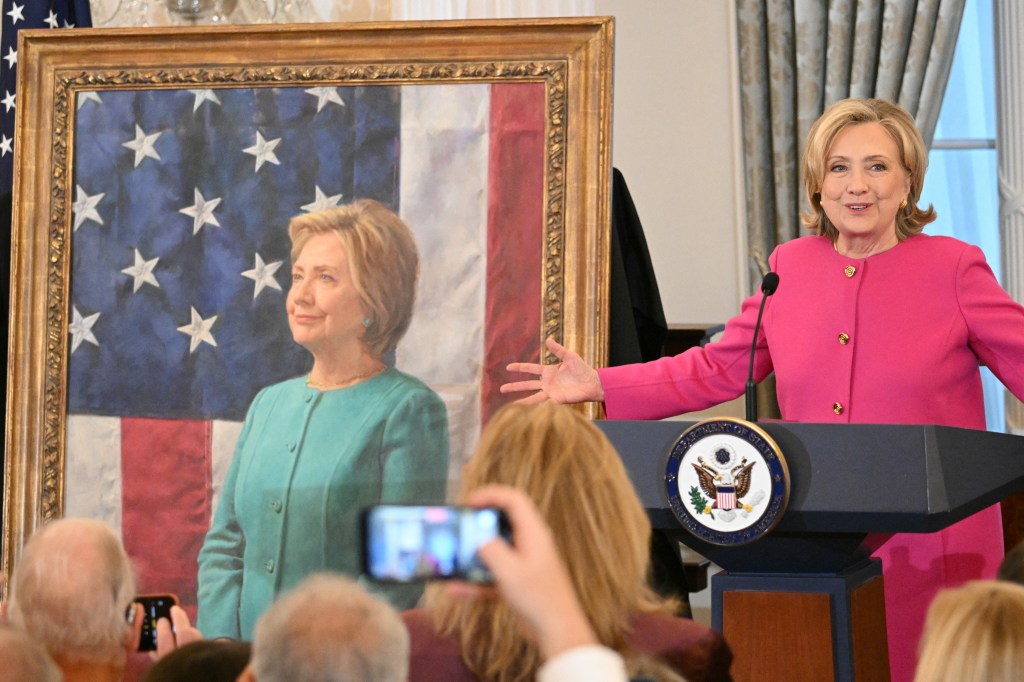 Former Secretary of State Hillary Clinton speaks at the unveiling of her portrait, in the Benjamin Franklin Room of the US Department of State in Washington, DC, on September 26, 2023. (Photo by Mandel NGAN / AFP)