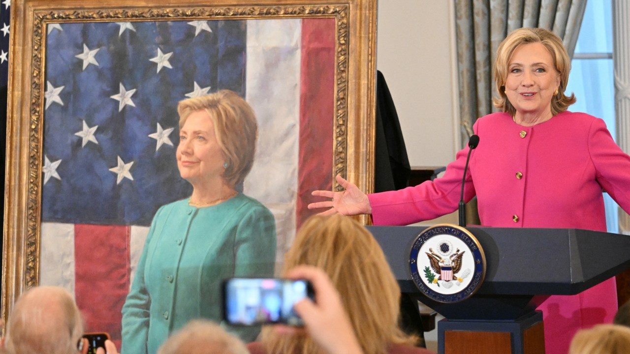 Former Secretary of State Hillary Clinton speaks at the unveiling of her portrait, in the Benjamin Franklin Room of the US Department of State in Washington, DC, on September 26, 2023. (Photo by Mandel NGAN / AFP)