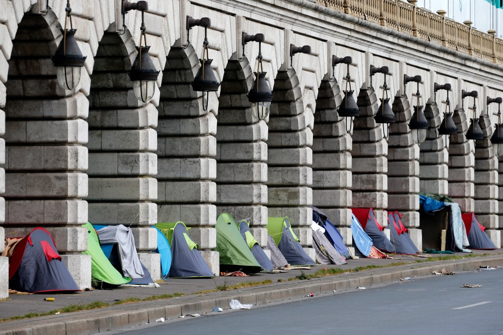 PARIS, FRANCE - APRIL 30: Tents are installed by homeless people under the Bercy bridge during the outbreak of Coronavirus disease (COVID-19) on April 30, 2021 in Paris, France. The increase in economic precariousness accentuated by the health crisis due to Covid-19 forces many people to sleep in the street. (Photo by Chesnot/Getty Images)