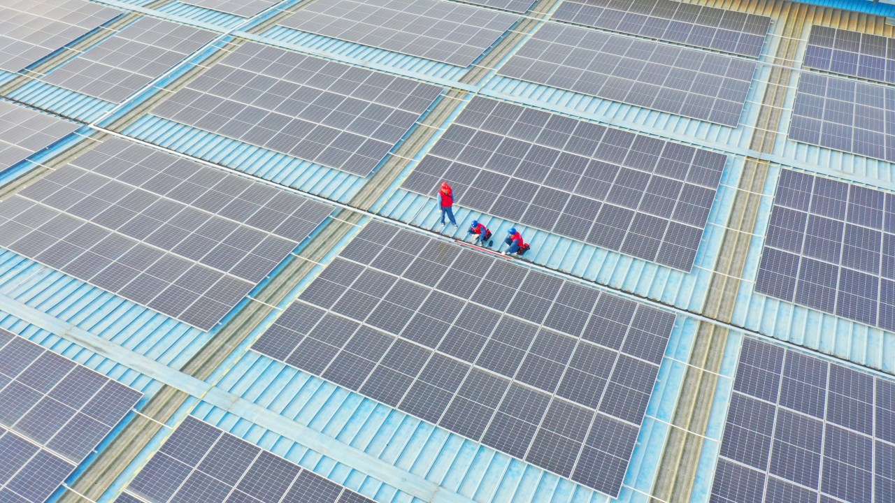 CHUZHOU, CHINA - SEPTEMBER 11, 2023 - Technicians inspect photovoltaic power generation facilities on the roof of a production plant in Chuzhou, Anhui province, China, September 11, 2023. (Photo by Costfoto/NurPhoto via Getty Images)