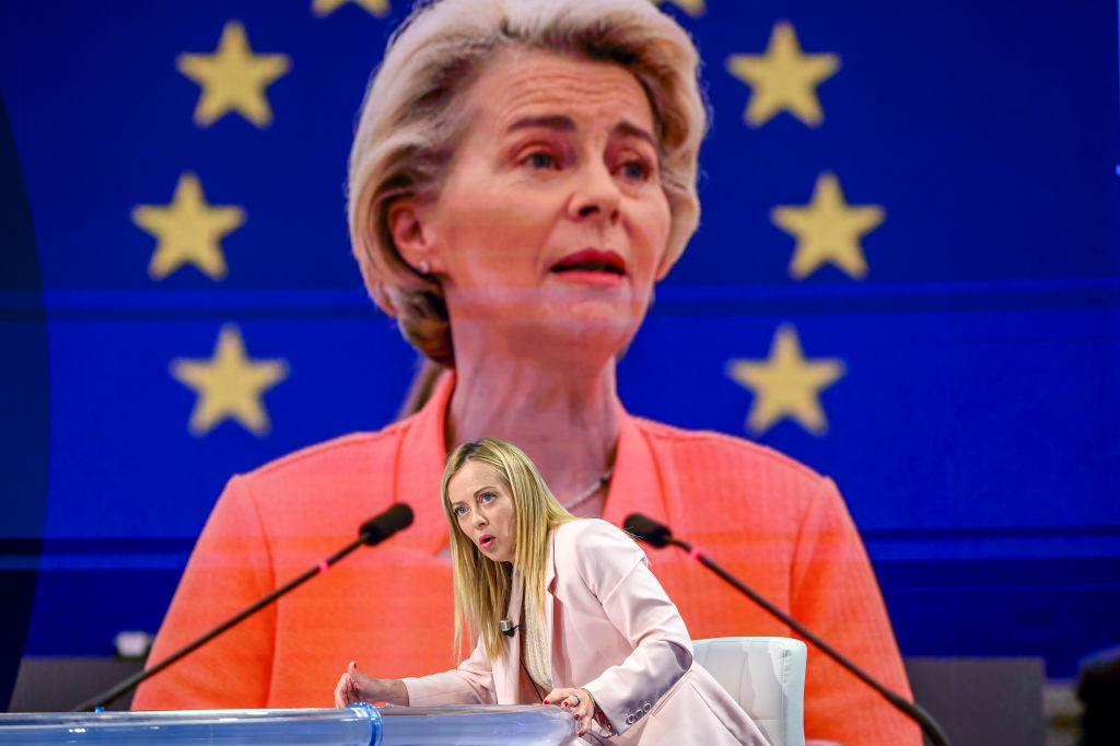 ROME, ITALY - SEPTEMBER 13: A picture of the European Commission President Ursula von der Leyen is displayed on the screen as Italian Prime Minister Giorgia Meloni is seen on the set of the tv show "Porta A Porta" at Rai Studios on September 13, 2023 in Rome, Italy. (Photo by Antonio Masiello/Getty Images)