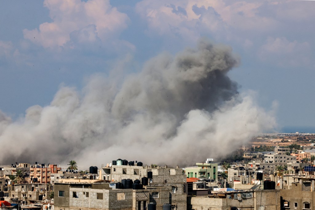 Smoke billows after an Israeli air strike in Rafah in the southern Gaza Strip on October 16, 2023. The death toll from Israeli strikes on the Gaza Strip has risen to around 2,750 since Hamas's deadly attack on southern Israel last week, the Gaza health ministry said October 16. Some 9,700 people have also been injured as Israel continued its withering air campaign on targets in the Palestinian coastal enclave, the Hamas-controlled ministry added. (Photo by SAID KHATIB / AFP)