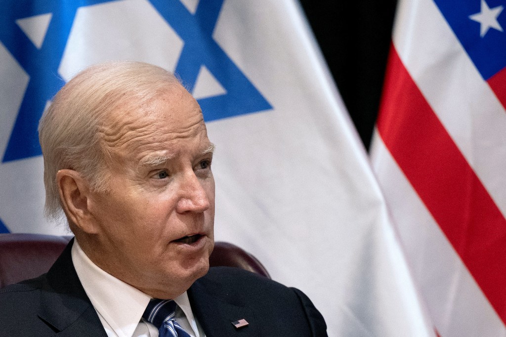 US President Joe Biden joins Israel's Prime Minister for the start of the Israeli war cabinet meeting, in Tel Aviv on October 18, 2023, amid the ongoing battles between Israel and the Palestinian group Hamas. US President Joe Biden landed in Tel Aviv on October 18, 2023 as Middle East anger flared after hundreds were killed when a rocket struck a hospital in war-torn Gaza, with Israel and the Palestinians quick to trade blame. (Photo by Brendan Smialowski / AFP)