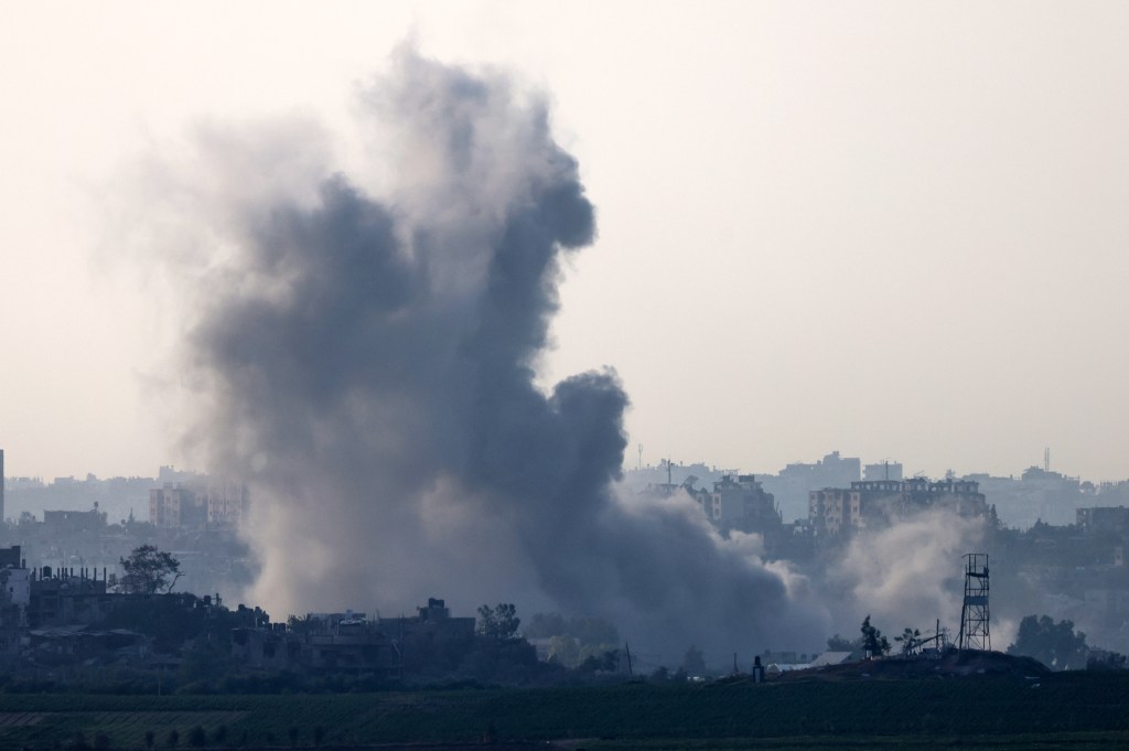 A picture taken from Israel's southern city of Sderot shows smoke billowing during a Israeli strike on Gaza on October 23, 2023, amid ongoing battles between Israel and the Palestinian group Hamas. (Photo by Jack Guez / AFP)