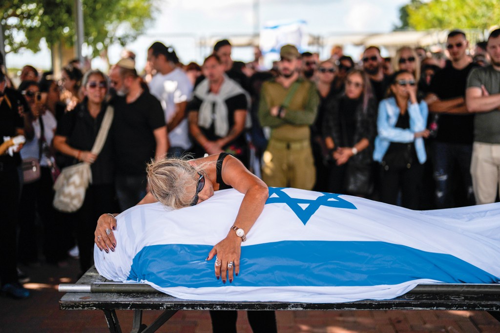 CHORANDO A PERDA - Enterro em Israel: população ainda em choque com o ataque bárbaro cometido pelo Hamas
