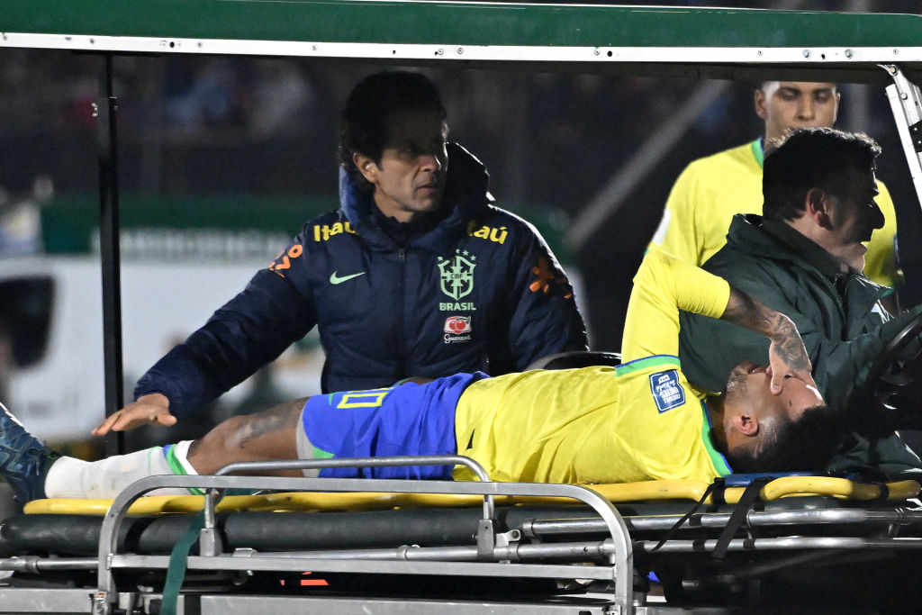 MONTEVIDEO, URUGUAY - OCTOBER 17: Neymar Jr. of Brazil reacts after being injured during the FIFA World Cup 2026 Qualifier match between Uruguay and Brazil at Centenario Stadium on October 17, 2023 in Montevideo, Uruguay. (Photo by Guillermo Legaria/Getty Images)