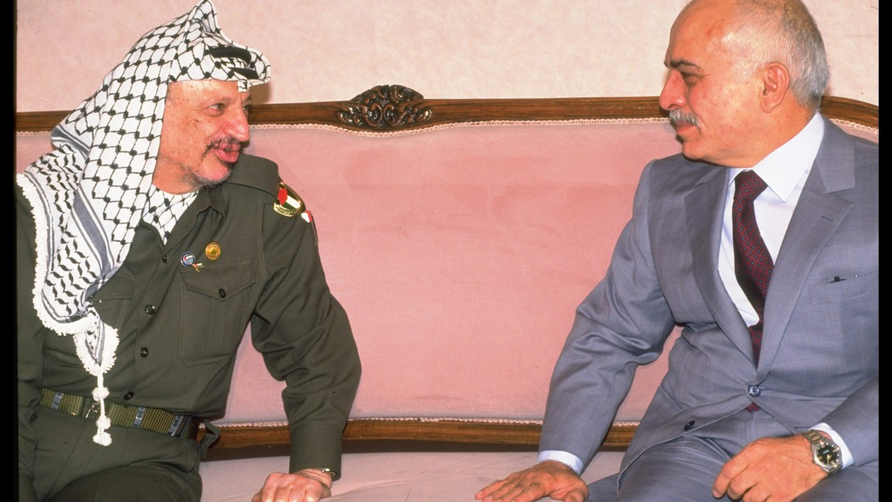King Hussein (R) sitting w. Yasser Arafat