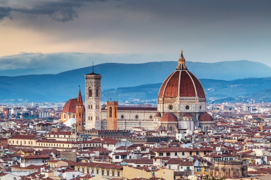 The historic centre of Florence is protected by UNESCO as a World Heritage Site. The dome of Basilica di Santa Maria del Fiore otherwise known as the Duomo can be seen.