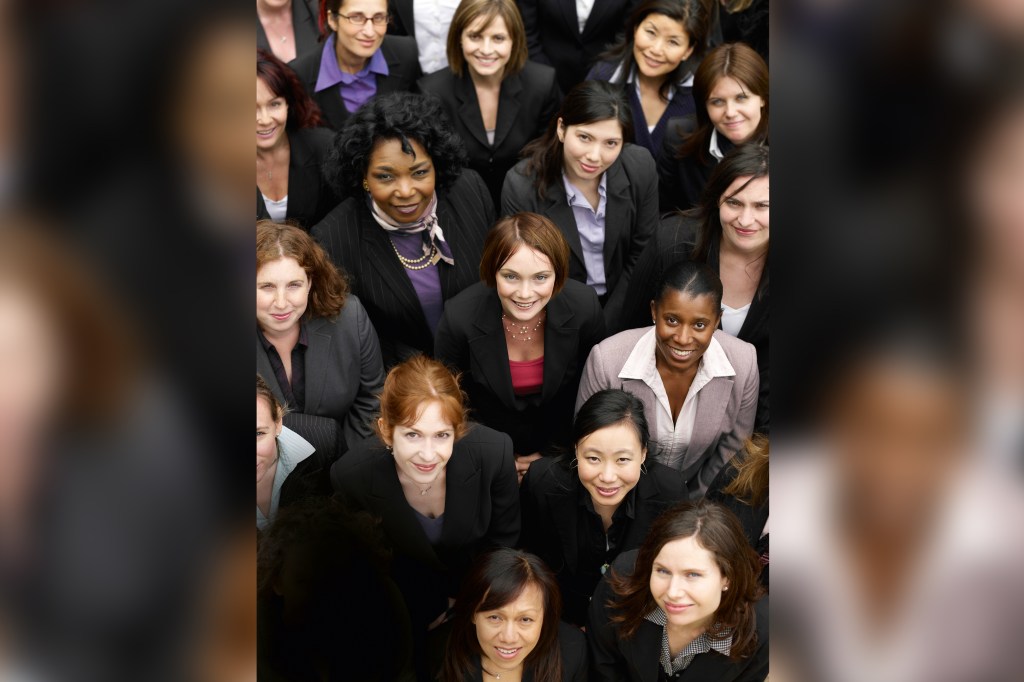 Group of business women looking up, portrait, elevated view, close up