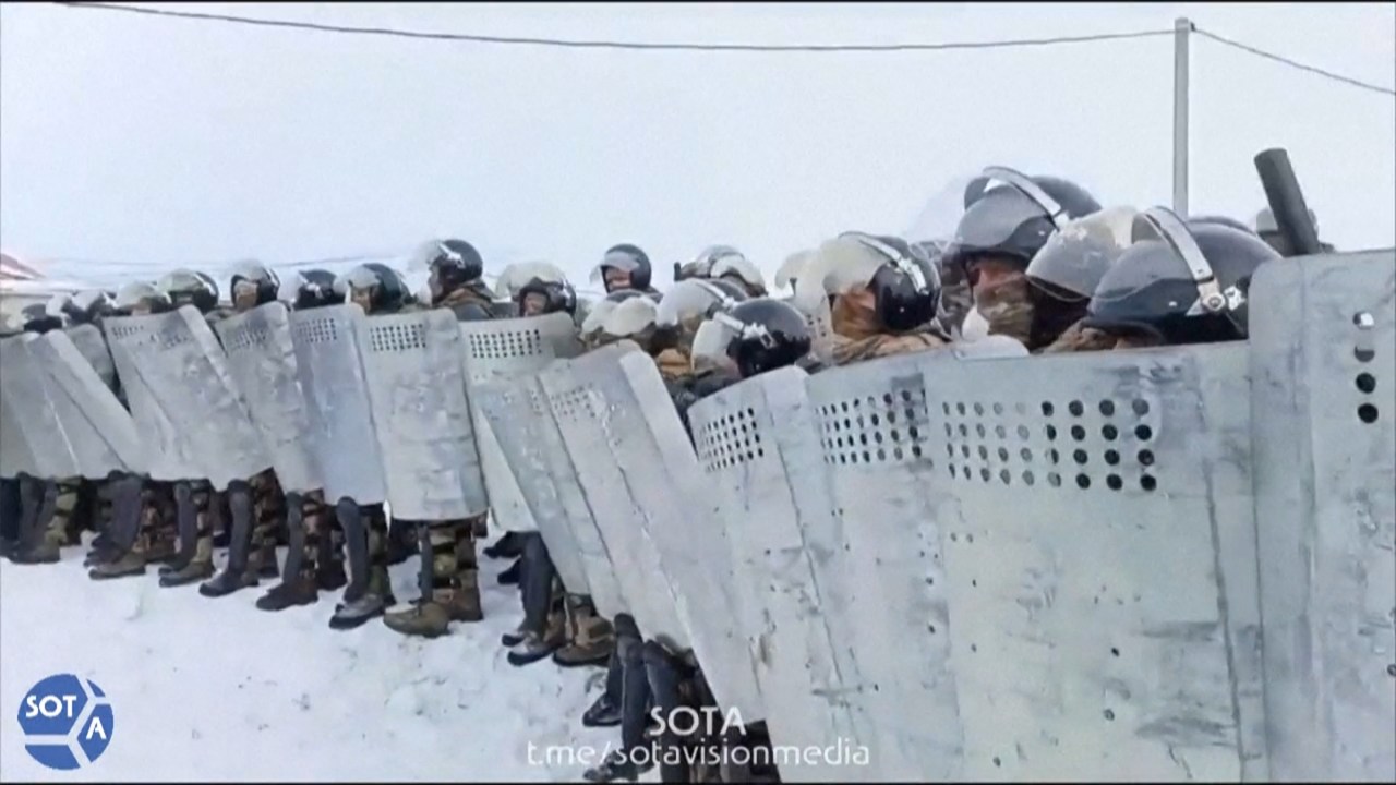 A video grab taken from a footage by SOTA on January 17, 2024 shows Russian police during protests that erupted in the central Bashkortostan region after a court sentenced a local activist to four years in prison. Fail Alsynov, who campaigns against gold mining in the Urals region and advocates for the protection of the large ethnic Bashkir population's language, was sentenced for "inciting hatred" in the town of Baymak. (Photo by STRINGER / SOTA / AFP) / RESTRICTED TO EDITORIAL USE - MANDATORY CREDIT "AFP PHOTO / ESN/SOTAvision" - NO MARKETING NO ADVERTISING CAMPAIGNS - DISTRIBUTED AS A SERVICE TO CLIENTS