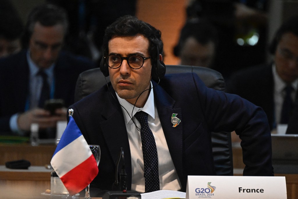 France's Minister for Foreign and European Affairs Stephane Sejourne (R) attends the G20 foreign ministers meeting in Rio de Janeiro, Brazil, on February 21, 2024. Foreign ministers of the G20 group of nations open a two-day meeting Wednesday in Brazil, with a bleak outlook for progress on a thorny agenda of conflicts and crises, from the Gaza and Ukraine wars to growing polarization. (Photo by MAURO PIMENTEL / AFP)