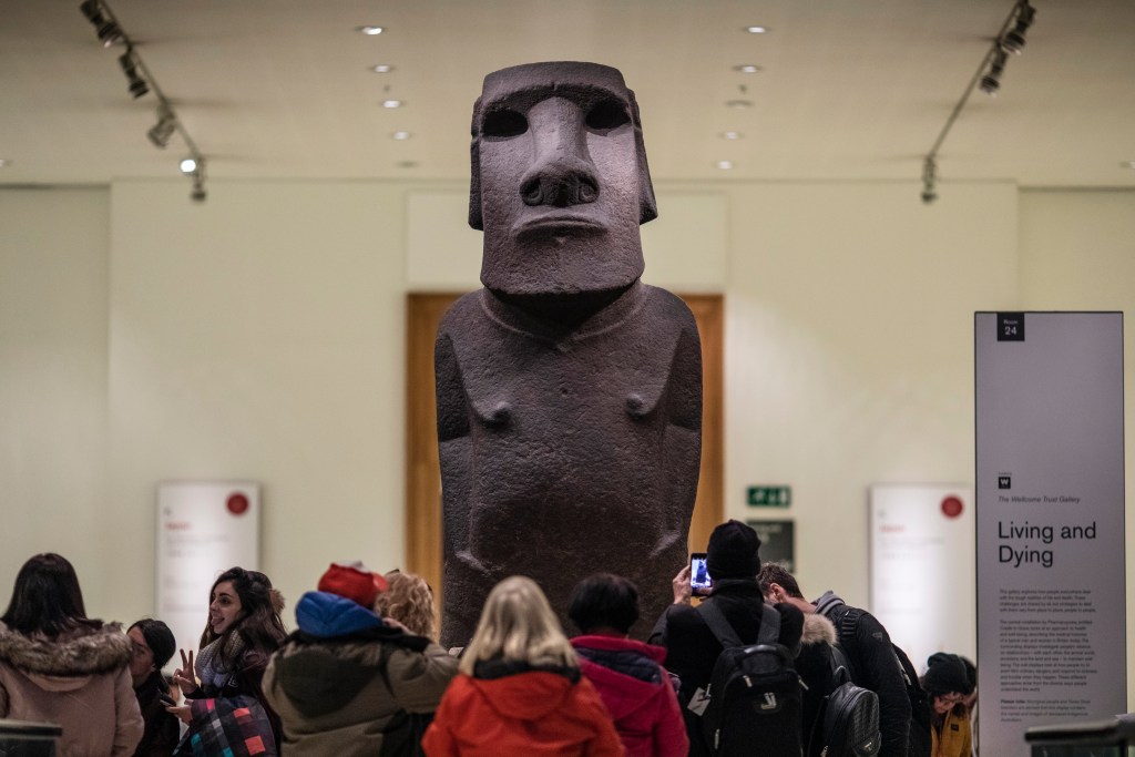 LONDON, ENGLAND - NOVEMBER 22: A basalt Easter Island Head figure, known as Hoa Hakananai'a, translated as 'lost or stolen friend' is displayed at the British Museum on November 22, 2018 in London, England. The Governor of the Easter Islands, Tarita Alarcón Rapu, has 'pleaded' with the British Museum to return the piece, which was taken by the British members of the U.K.’s Royal Navy of the H.M.S. Topaze in 1868. (Photo by Dan Kitwood/Getty Images)