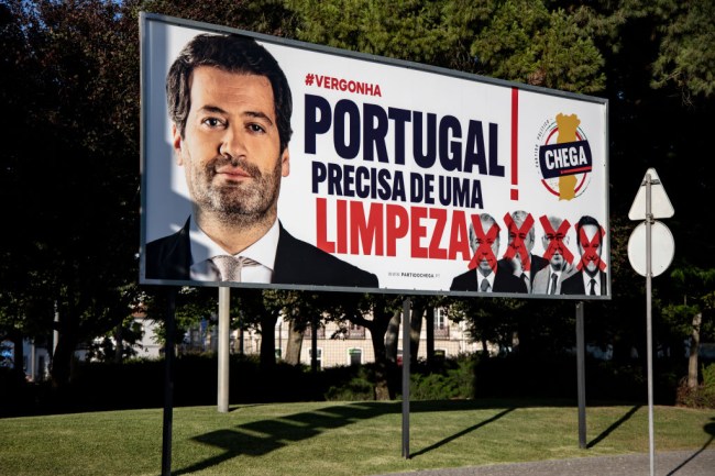 A billboard of the populist far right party Chega with a photo of the President Andre Ventura and the slogan 'Shame, Portugal needs some cleanness' is pictured in Santarem, Portugal on July 7, 2023. (Photo by Emmanuele Contini/NurPhoto via Getty Images)
