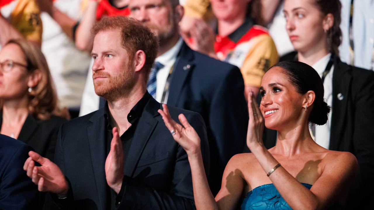 O Príncipe Harry e Meghan Markle em cerimônia de encerramento dos Jogos Invictus de 2023
