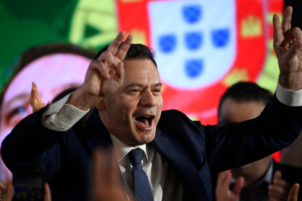 Democratic Alliance (AD) leader Luis Montenegro celebrates his victory as he addresses supporters at the party's election night headquarters, in Lisbon on March 10, 2024. Portugal's main centre-right party narrowly defeated the incumbent Socialists but fell well short of a majority in a general election today in which far-right Chega surged to become a potential kingmaker. (Photo by MIGUEL RIOPA / AFP)