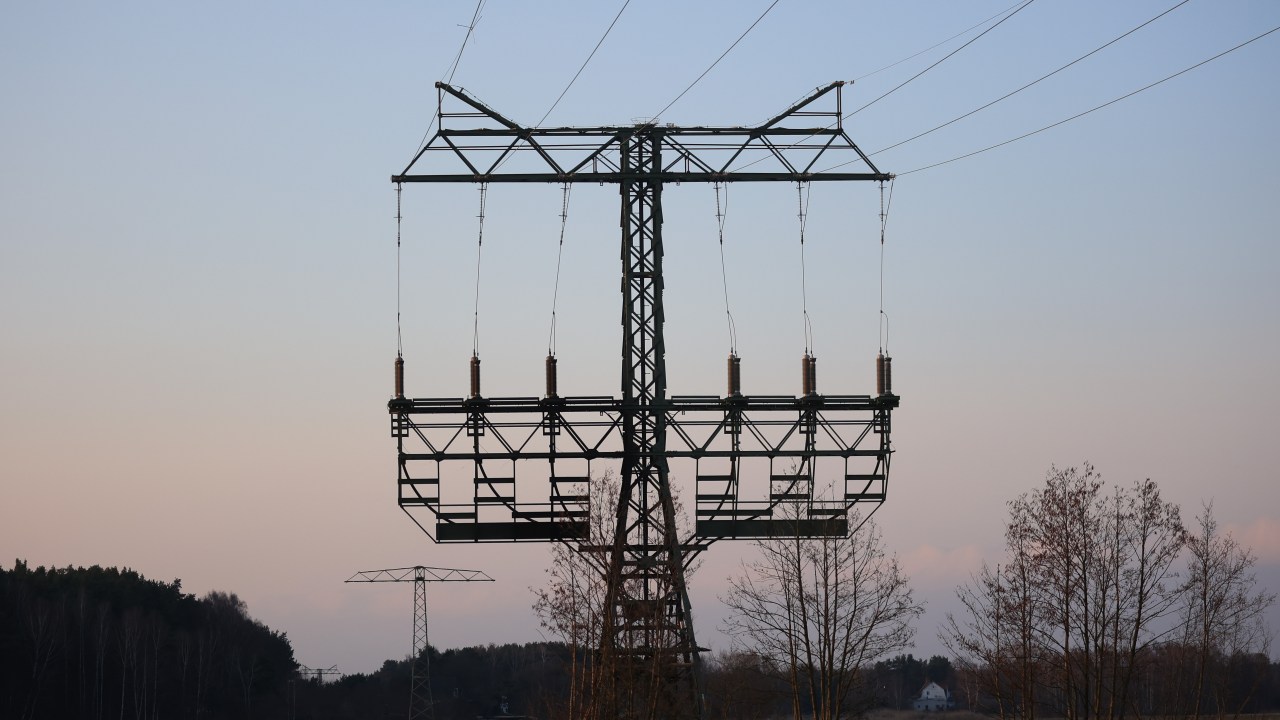 A burnt electricity pylon in Brandenburg, near the Tesla Inc. Gigafactory in Gruenheide, Germany, on Tuesday, March 5, 2024. Tesla halted production at its factory outside of Berlin and sent workers home after suspected arson at a nearby high-voltage pylon caused power failures throughout the region. Photographer: Krisztian Bocsi/Bloomberg via Getty Images