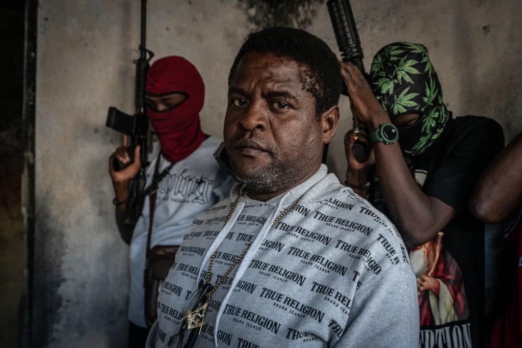 PORT-AU-PRINCE, HAITI - FEBRUARY 22: Gang Leader Jimmy 'Barbeque' Cherizier with G-9 federation gang members in the Delmas 3 area on February 22, 2024 in Port-au-Prince, Haiti. There has a been fresh wave of violence in Port-au-Prince where, according to UN estimates, gangs control 80% of the city. (Photo by Giles Clarke/Getty Images)