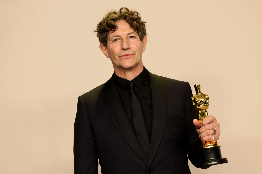 HOLLYWOOD, CALIFORNIA - MARCH 10: Jonathan Glazer, winner of the Best International Feature Film award for “The Zone of Interest”, poses in the press room during the 96th Annual Academy Awards at Ovation Hollywood on March 10, 2024 in Hollywood, California. (Photo by Arturo Holmes/Getty Images)