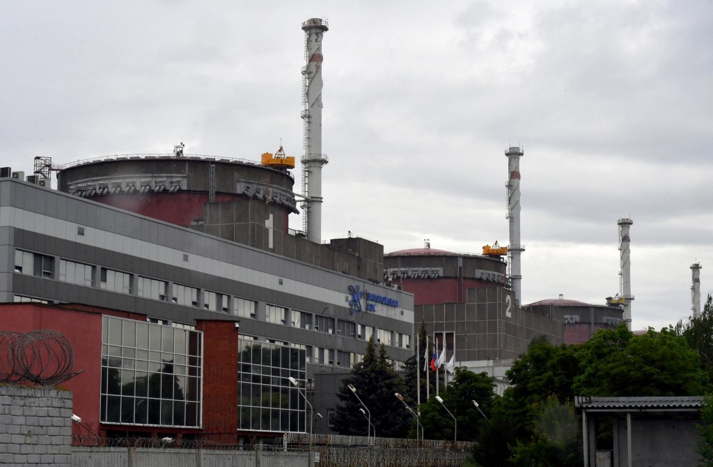 (FILES) A photo shows a view of the Russian-controlled Zaporizhzhia nuclear power plant in southern Ukraine on June 14, 2023. Russia on April 7, 2024, said Ukraine attacked the Moscow-controlled Zaporizhzhia Nuclear Power Plant with a drone, with the International Atomic Energy Agency (IAEA) urging restraint. (Photo by Olga MALTSEVA / AFP)