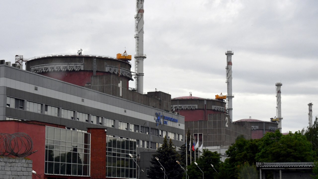 (FILES) A photo shows a view of the Russian-controlled Zaporizhzhia nuclear power plant in southern Ukraine on June 14, 2023. Russia on April 7, 2024, said Ukraine attacked the Moscow-controlled Zaporizhzhia Nuclear Power Plant with a drone, with the International Atomic Energy Agency (IAEA) urging restraint. (Photo by Olga MALTSEVA / AFP)