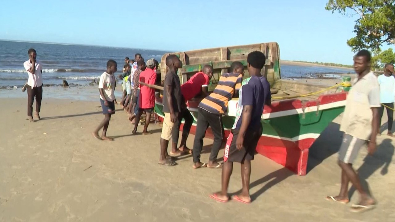 This video grab obtained by AFPTV from TVM on April 8, 2024 shows the boat, that sunk off the north coast of Mozambique killing 96 people, on the Island of Mozambique. A makeshift ferry boat has v, including children, authorities said on April 8, 2024, raising an earlier death toll. The converted fishing boat, carrying about 130 people, ran into trouble late on April 7, 2024 as it was trying to reach an island off Nampula province, officials said. Most of those on board were trying to escape the mainland because of a panic caused by disinformation about cholera, according to Nampula's secretary of state Jaime Neto. (Photo by TVM / AFP) / RESTRICTED TO EDITORIAL USE - MANDATORY CREDIT "AFP PHOTO / TVM " - NO MARKETING NO ADVERTISING CAMPAIGNS - DISTRIBUTED AS A SERVICE TO CLIENTS