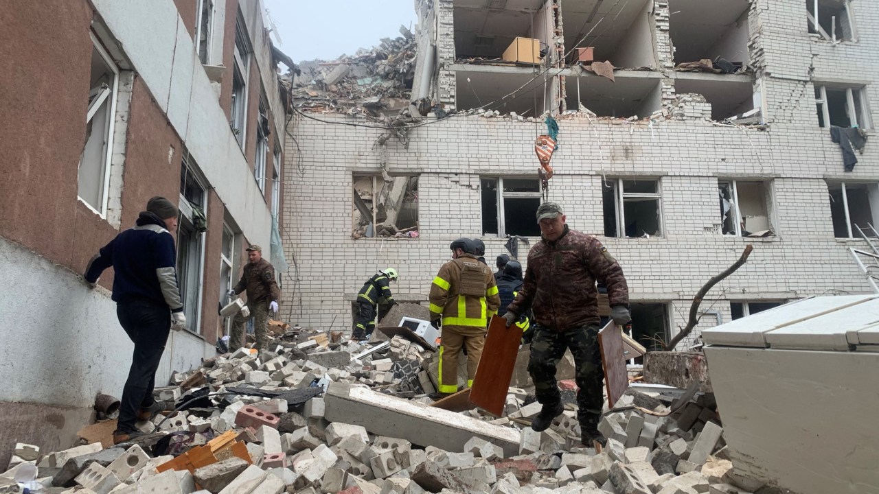 Ukrainian rescuers clear the rubble of a destroyed building following a missile attack in Chernigiv on April 17, 2024, amid the Russian invasion of Ukraine. A Russian strike on April 17, 2024 on the northern Ukrainian city of Chernigiv killed nine people and wounded about 20, as Kyiv sounds the alarm over shortages in its air defence capabilities. (Photo by Sergiy BUTKO / AFP)