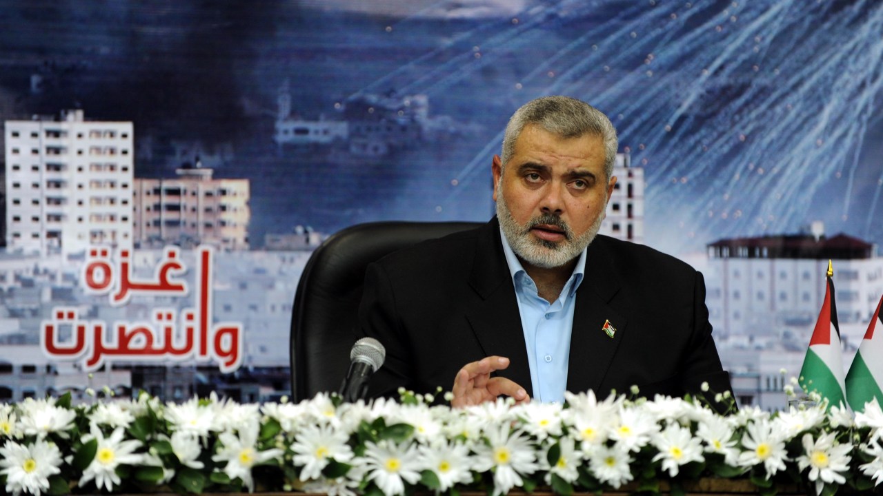 UNDISCLOSED LOCATION GAZA CITY - DECEMBER 27: In this handout image from the Palestinian Prime Minister's Office (PPMO), Hamas chief in Gaza Ismail Haniyeh speaks during a televised address from an undisclosed location on December 27, 2009 in the Gaza Strip. Haniyeh spoke of Gaza's "steadfastness", on the first anniversary of the major Israeli offensive launched against the territory. (Photo by PPO via Getty Images)