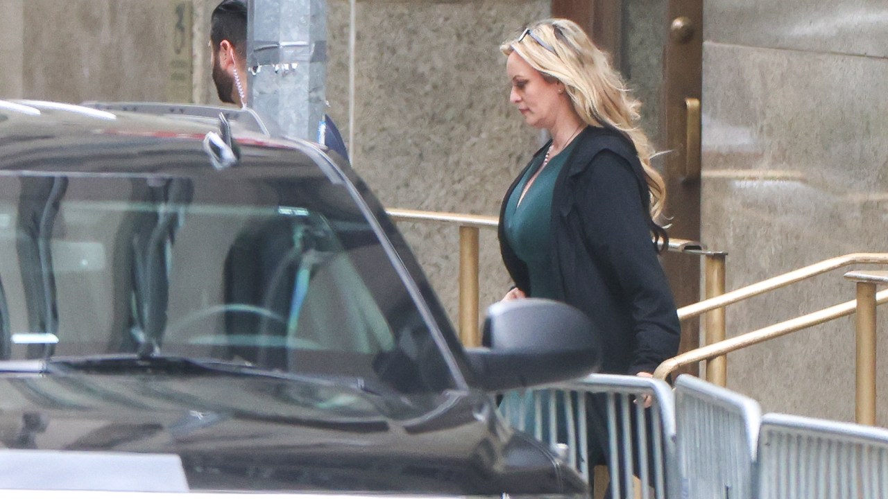Stormy Daniels leaves Manhattan Criminal Court after testifying at former US President Donald Trump's trial for allegedly covering up hush money payments linked to extramarital affairs, in New York City, on May 9, 2024. X-rated film actress Daniels returned to the witness stand on Thursday at Trump's hush money trial for another round of grilling by attorneys for the former president. (Photo by Charly TRIBALLEAU / AFP)