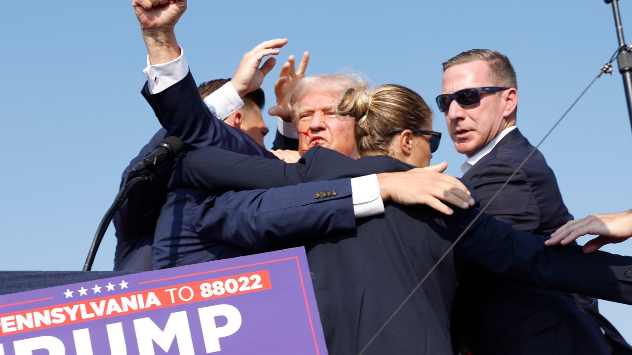 BUTLER, PENNSYLVANIA - JULY 13: Republican presidential candidate former President Donald Trump is rushed offstage during a rally on July 13, 2024 in Butler, Pennsylvania. (Photo by Anna Moneymaker/Getty Images)