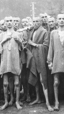 Starved prisoners, nearly dead from hunger, pose in concentration camp May 7, 1945 in Ebensee, Austria. The camp was reputedly used for "scientific" experiments.