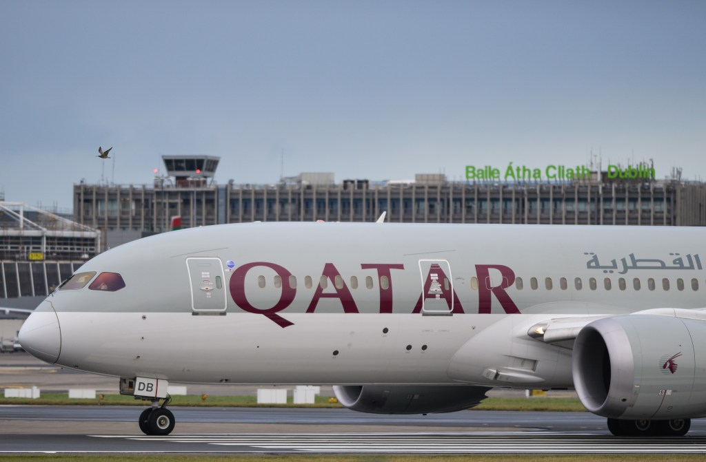 An Air Qatar plane is about to take off on the runway at Dublin airport. On Thursday, 14 December 2017, in Dublin, Ireland. (Photo by Artur Widak/NurPhoto via Getty Images)
