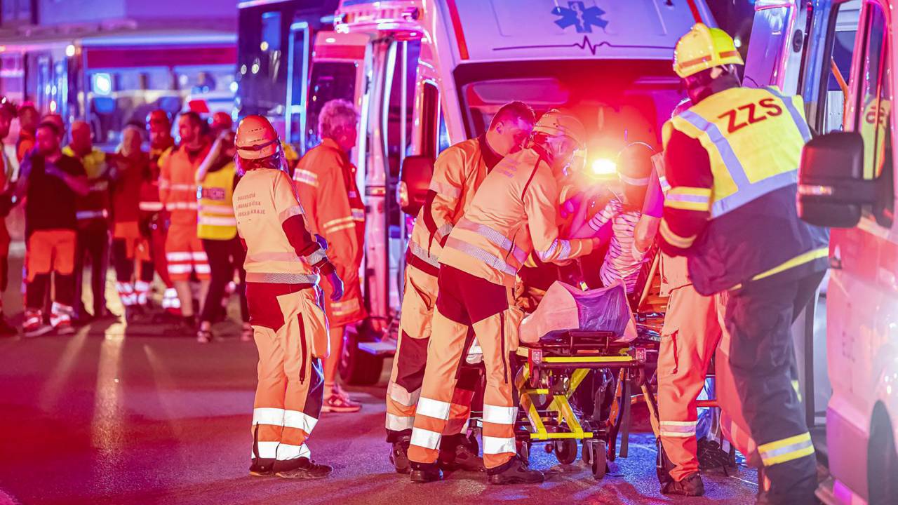 This handout from the HZS Czech Republic released on June 6, 2024 shows an injured person receiving medical attention from emergency workers at the scene of a train crash in Pardubice. Four people died and dozens were injured when an express train crashed head-on with a freight train in the Czech city of Pardubice late on June 5, an emergency services spokesperson said. (Photo by Michal FANTA / HZS CZECH REPUBLIC / AFP) / -----EDITORS NOTE --- RESTRICTED TO EDITORIAL USE - MANDATORY CREDIT "AFP PHOTO / HZS CZECH REPUBLIC " - NO MARKETING - NO ADVERTISING CAMPAIGNS - DISTRIBUTED AS A SERVICE TO CLIENTS