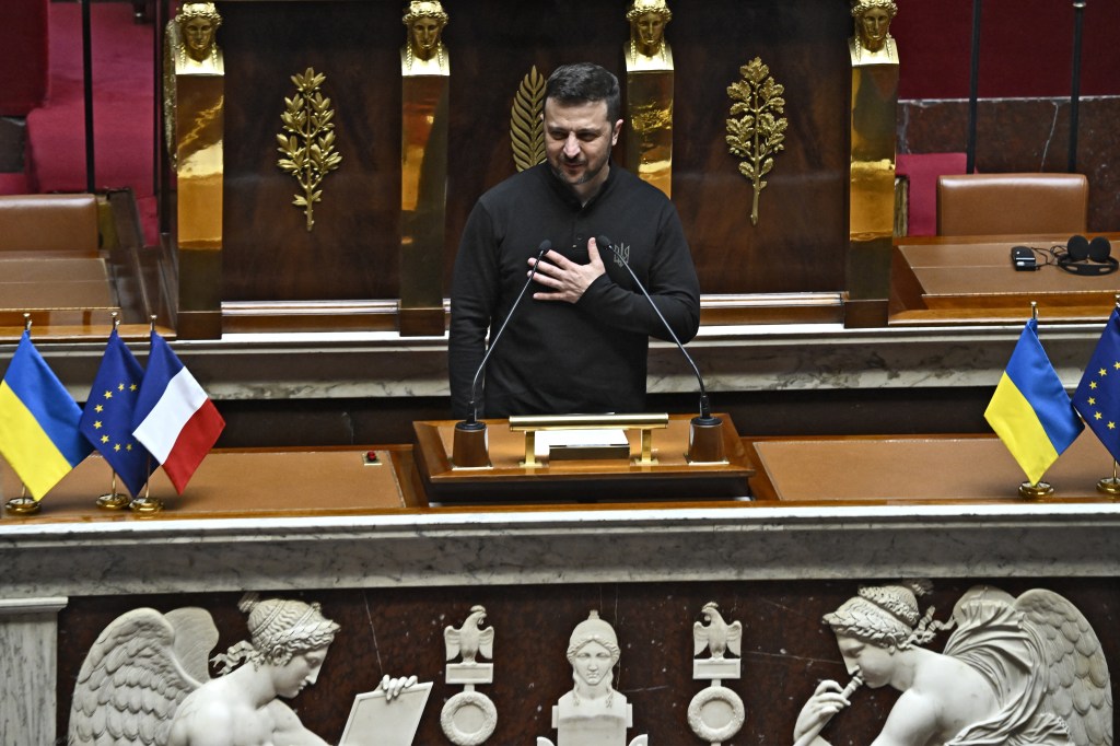Ukraines President Volodymyr Zelensky delivers a speech at the National Assembly in Paris on June 7, 2024. (Photo by JULIEN DE ROSA / AFP)
