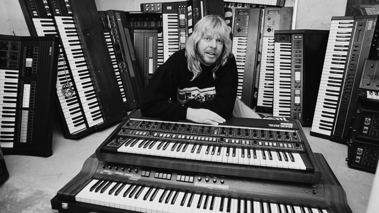 English keyboardist, songwriter, producer, television and radio presenter, and author Rick Wakeman with his collections of keyboards, UK, 1st October 1984. (Photo byButler/Daily Express/Hulton Archive/Getty Images)