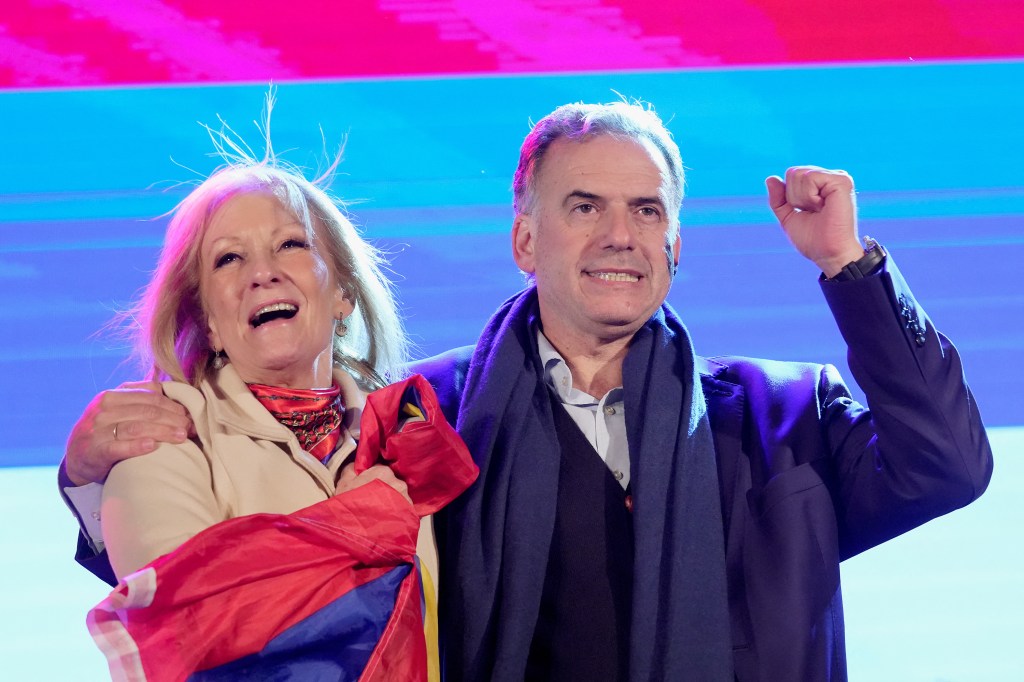 Picture released by ADHOC agency showing Uruguay's pre-presidential candidates for the leftist Frente Amplio party, Yamandu Orsi (R) and Carolina Cosse, celebrating the results of the primary elections in Montevideo on June 30, 2024. (Photo by Javier Calvelo / adhoc / AFP) / Uruguay OUT / RESTRICTED TO EDITORIAL USE - MANDATORY CREDIT "AFP PHOTO/ ADHOC / Javier CALVELO" - NO MARKETING NO ADVERTISING CAMPAIGNS - DISTRIBUTED AS A SERVICE TO CLIENTS