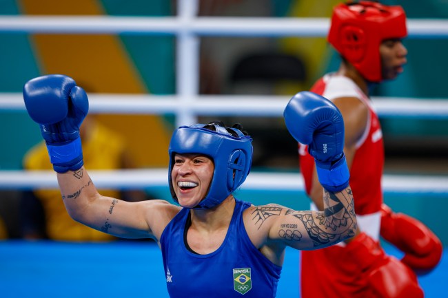 SANTIAGO, CHILE - OCTOBER 27: Beatriz Ferreira of Brazil celebrates winning the gold medal after the fight with Colombian Angie Paola Valdes (red) in women's boxing under 60kg on Day 7 of Santiago 2023 Pan Am Games on October 27, 2023 in Santiago, Chile. (Photo by Rodolfo Buhrer/Eurasia Sport Images/Getty Images)