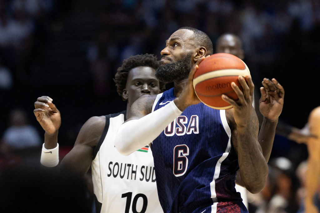 LONDON, ENGLAND: JULY 20: LeBron James #6 of the United States drives to the basket past JT Thor #10 of South Sudan during the USA V South Sudan, USA basketball showcase in preparation for the Paris Olympic Games at The O2 Arena on July 20th, 2024, in London, England. (Photo by Tim Clayton/Corbis via Getty Images)