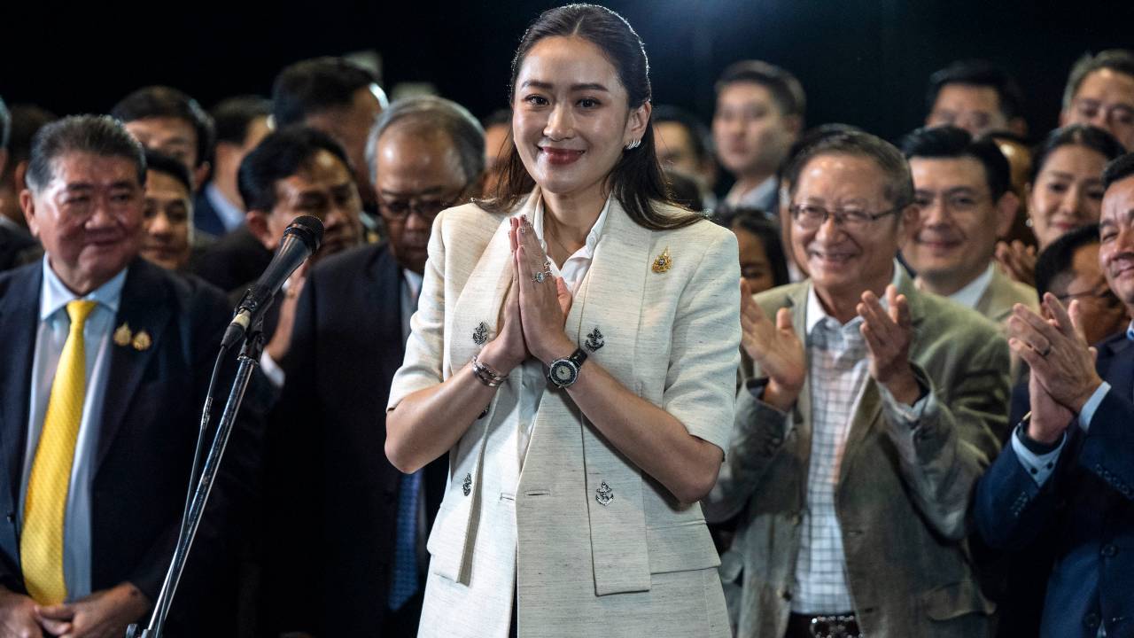Thailand's new Prime Minister Paetongtarn Shinawatra, known by her nickname "Ung Ing" and daughter of former prime minister Thaksin Shinawatra, gestures during a press conference in Bangkok on August 16, 2024. Thai lawmakers on August 16 appointed the 37-year-old daughter of billionaire Thaksin Shinawatra as prime minister, elevating a third member of the influential but divisive clan to the nation's top job. (Photo by Chanakarn Laosarakham / AFP)