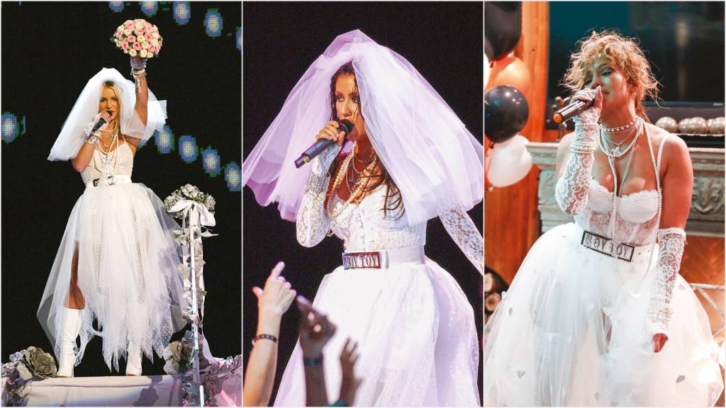 GettyImages-74699171.jpg TRIBUTOÀ RAINHA - Britney Spears (à esq.), Christina Aguilera e Jennifer Lopez: homenagem com releituras daquele icônico e controverso figurino